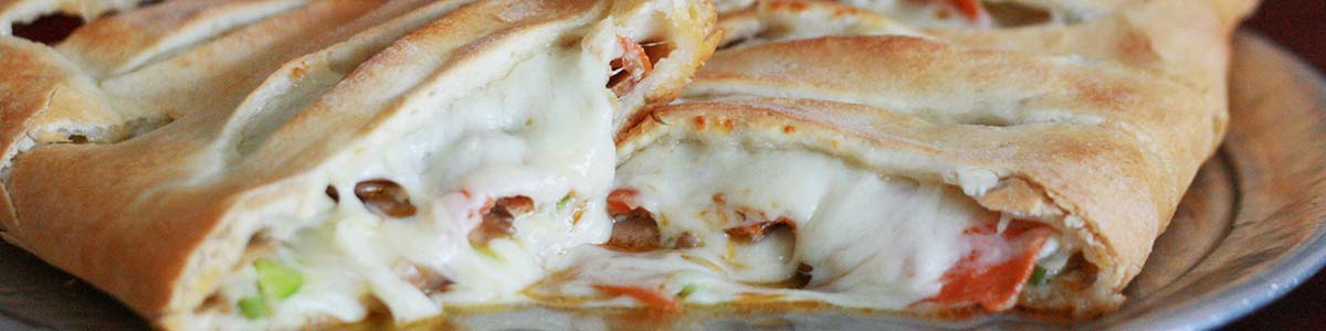 Calzone with cheese close up